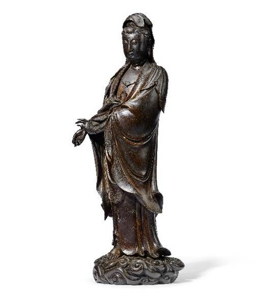 A Rare and Large Silver-Inlaid Bronze Figure of Guanyin, 16th/17th Century Estimate: HK$3,500,000-4,500,000 Sold for HK$4,377,500