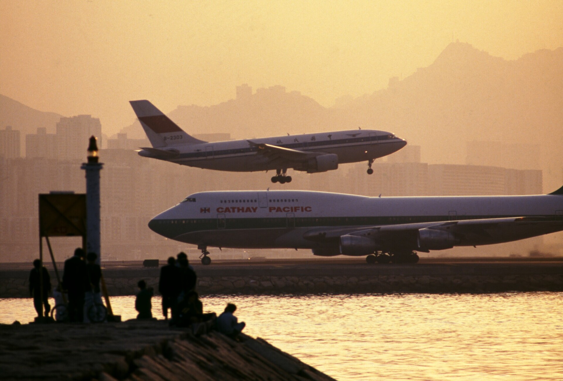 © Greg Girard, Chow Kai Tak Airport's single runway, Hong Kong 1988, Courtesy of Blue Lotus Gallery