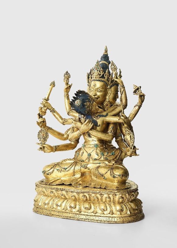 A gilt copper alloy figure of Guhyasamaja   Tibet, 15th/16th century 
