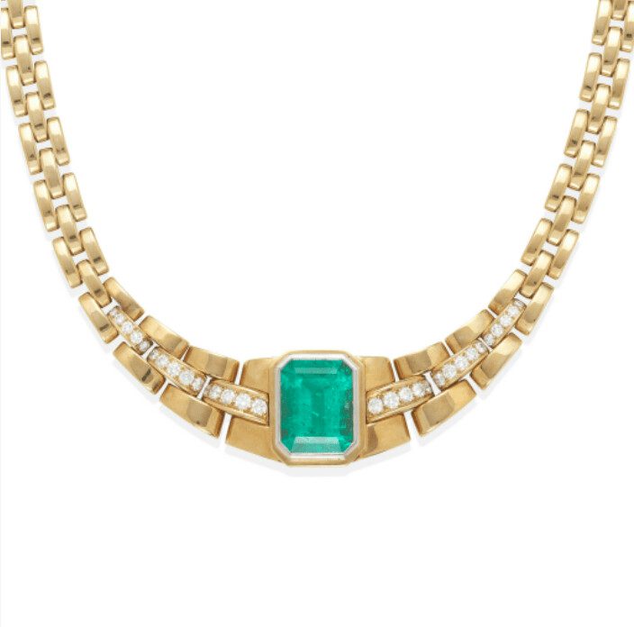 18 Karat gold emerald, and diamond Cariter necklace