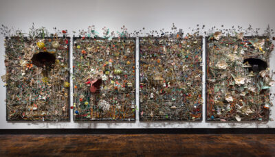 Nick Cave, Garden Plot (aka Wall Relief), 2013. Steel, found textiles, and found ceramic, glass, and metal objects, with beads, four parts, 97 × 74 × 21 in. each. Courtesy the artist and Jack Shainman Gallery, New York. © Nick Cave. Photo: James Prinz