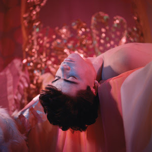 © Estate of James Bidgood; Hanging Off Bed (Bobby Kendall), mid-to-late 1960s/printed later; Digital C-print; Courtesy of CLAMP, New York, NY